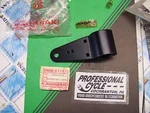 Kawasaki 70-72 F5 F9 350 F8 250 Nos Headlight Bracket Fork Ear 23064 001-21 Oem. Fixed Price $19.75.