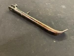 1989 Suzuki Kick Stand Side 42310-05250-019. Fixed Price $34.95.