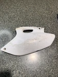 2001 - 2002 Yamaha Left Side Number Plate Plastic Fender. Fixed Price $15.00.